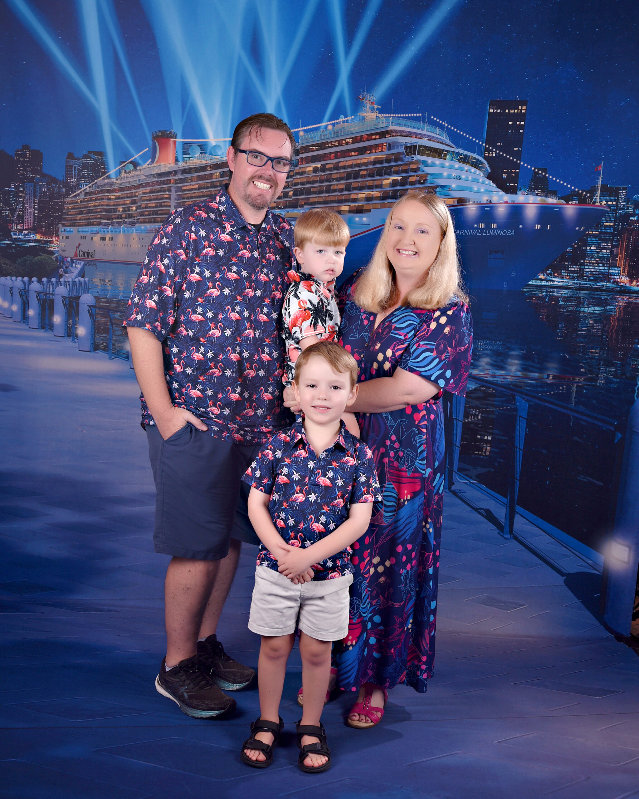 Mischief & Memories photo booth setup with backdrop and props.